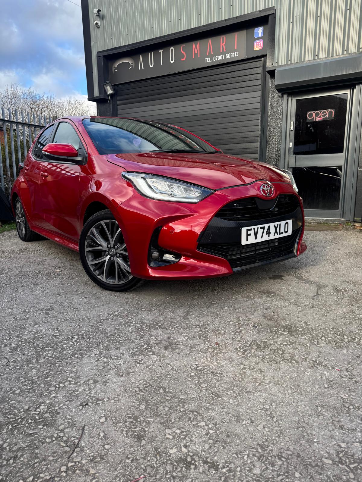 Finished red vehicle repaired by AutoSmart Body Repair